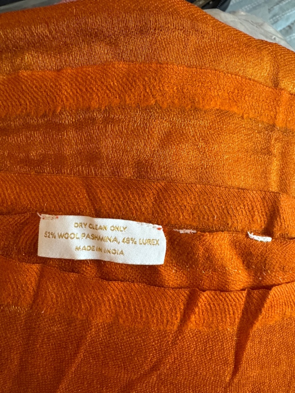 NICOBLU-JOSEPHINE REVERSIBLE PASHMINA SHAWL IN GOLD SHIMMER ORANGE. - Picture 8 of 8